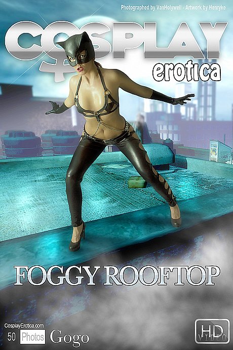 Solo model sticks out her long tongue while modelling fetish wear on a rooftop - Image 1 of 12  in Babe category  