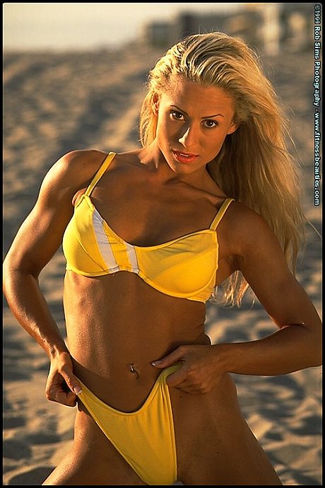 Fitness model Sarah Orbanic and a girlfriend pose on on a beach in bikinis - Image 8 of 15  in Lesbian category   featuring Sarah Orbanic 