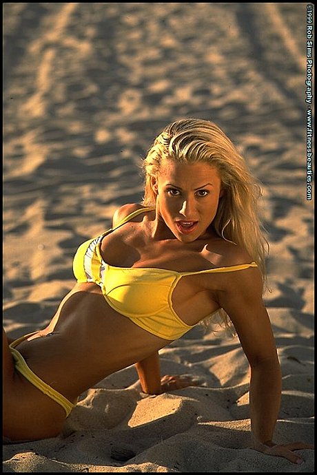 Fitness model Sarah Orbanic and a girlfriend pose on on a beach in bikinis - Image 14 of 15  in Lesbian category   featuring Sarah Orbanic 
