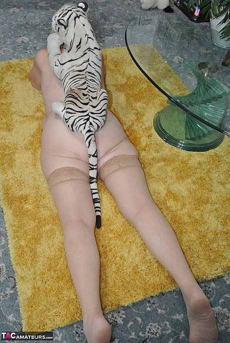 Blondy grandma Sparkle sports a pair of stockings while posing in the undressed - Image 16 of 16  in Legs category   featuring Sparkle 