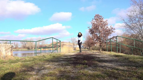 Cynthia Vellons squats on a tree stump to piss - #307339