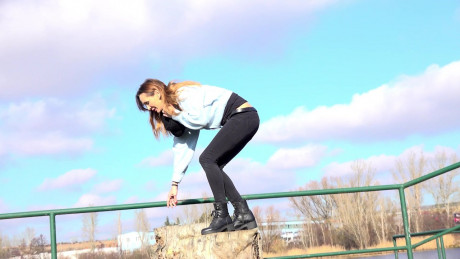 Cynthia Vellons squats on a tree stump to piss - #307341