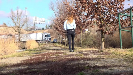 Cynthia Vellons squats on a tree stump to piss - #307353
