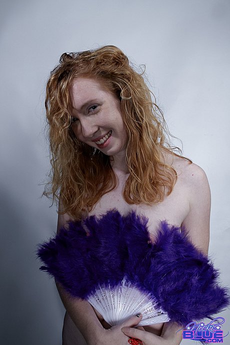 Natural ginger head Nicki Blue fans herself while modeling for a undressed solo shoot - Image 2 of 15  in Babe category   featuring Nicki Blue 