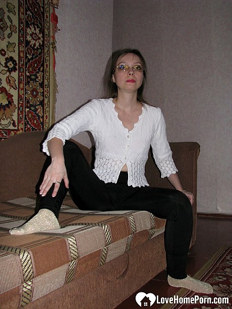 Dark-haired MILF strips to her socks and spreads her bushy coochie - Image 1 of 20  in Babe category  