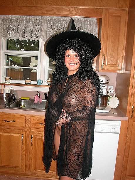 Wild amateur in a witch costume Belle gets messy with a pumpkin - Image 1 of 20  in Spreading category   featuring Belle 