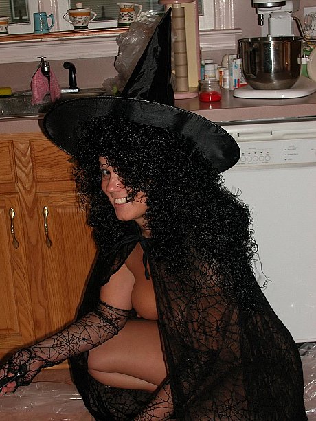 Wild amateur in a witch costume Belle gets messy with a pumpkin - Image 3 of 20  in Spreading category   featuring Belle 