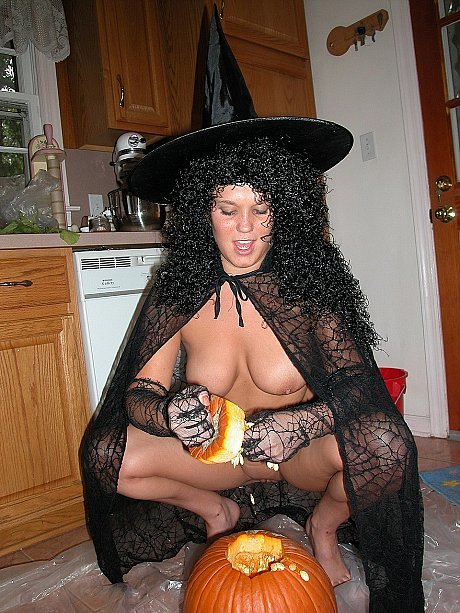 Wild amateur in a witch costume Belle gets messy with a pumpkin - Image 6 of 20  in Spreading category   featuring Belle 