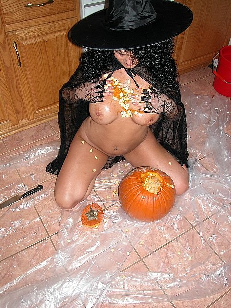 Wild amateur in a witch costume Belle gets messy with a pumpkin - Image 9 of 20  in Spreading category   featuring Belle 