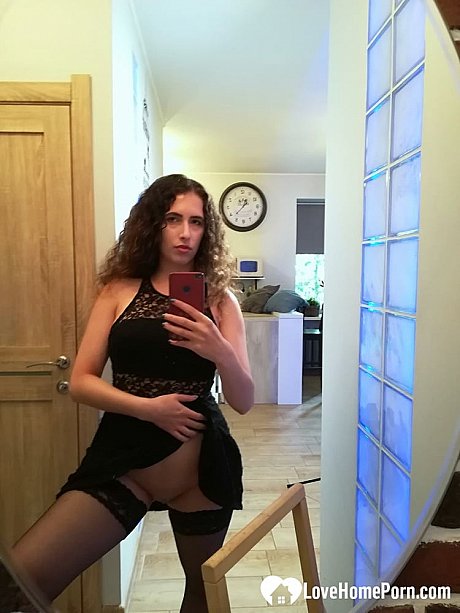 Curvaceous brunette strips and poses in her nylon leggings in the mirror - Image 3 of 21  in Amateur category  