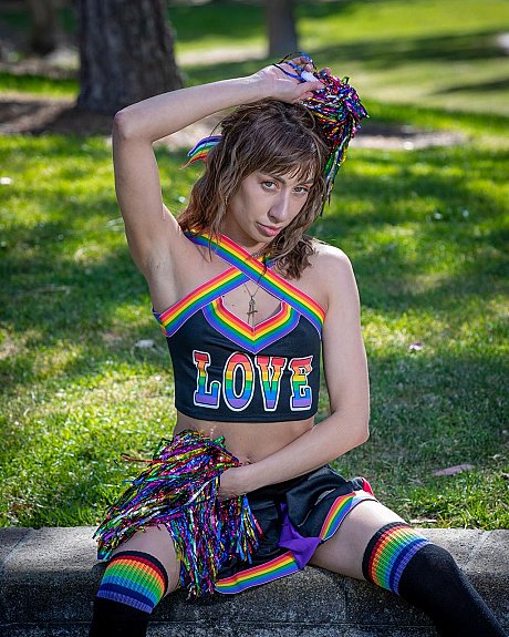 Skinny cheerleader flashes her large ass while dancing in public - Gallery #39310