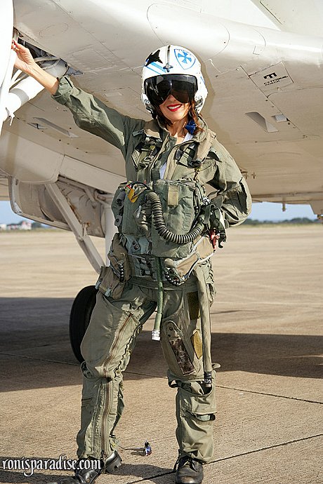 Skillful pilot Roni showing her monstrous breasts and shaved vagina on her plane - Image 1 of 15  in Pantyhose category   featuring Roni Ford 