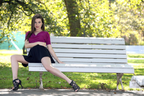 Ravishing European babe Serena poses on a park bench in a lovely short skirt - #248526