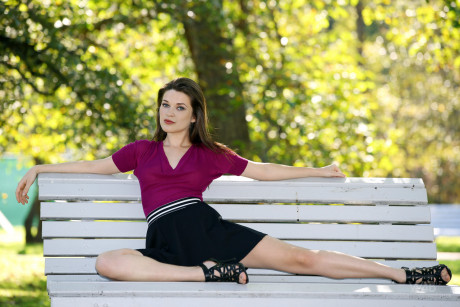 Ravishing European babe Serena poses on a park bench in a lovely short skirt - #248528