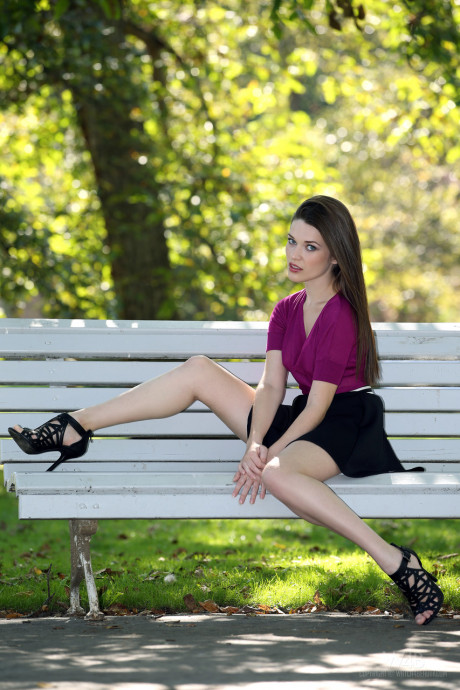 Ravishing European babe Serena poses on a park bench in a lovely short skirt - #248530