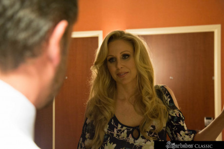 Fantastic looking MILF with enormous breasts Julia Ann rides a hot dong in underwear