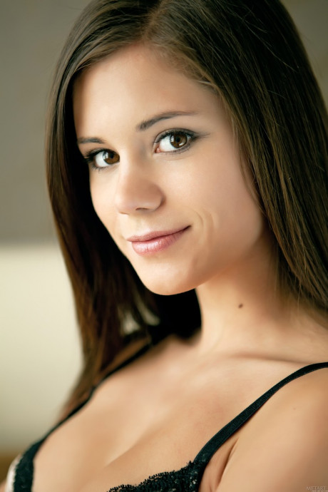 Gorgeous brunette newbie Caprice A posing naked on a leather sofa - #850069