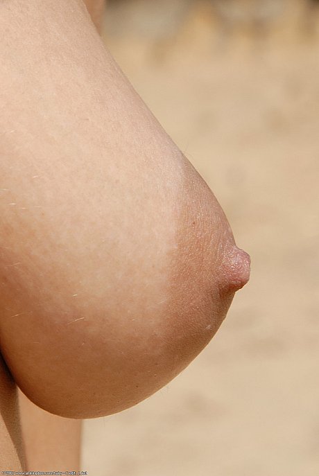 Young Stany poses nude on a sandy beach & shows her furry vagina up close - Image 1 of 20  in Outdoor category   featuring Stany 