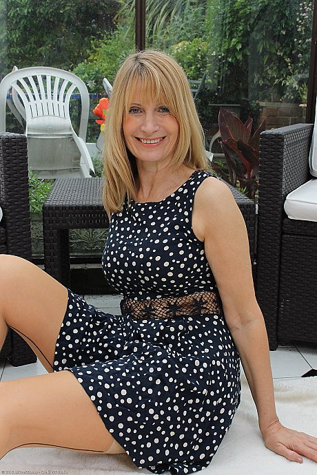 Cougar aunty in a wonderful dress Jane B flaunts her large boobies in nylons - Image 3 of 20  in Close Up category   featuring Jane B 