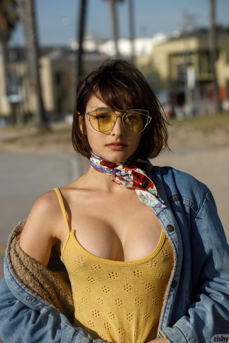 Adorable teen Basil Navas poses on the beach in yellow see-through bodysuit - #1079624