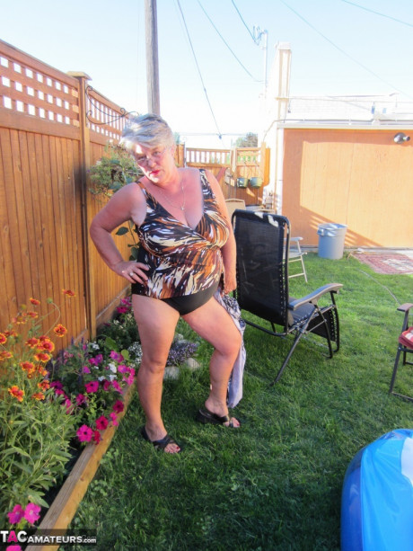 Fatty older granny Girdle Goddess peels to enjoy wading pool thin dip - #1264465