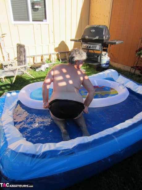 Fatty older granny Girdle Goddess peels to enjoy wading pool thin dip - #1264473