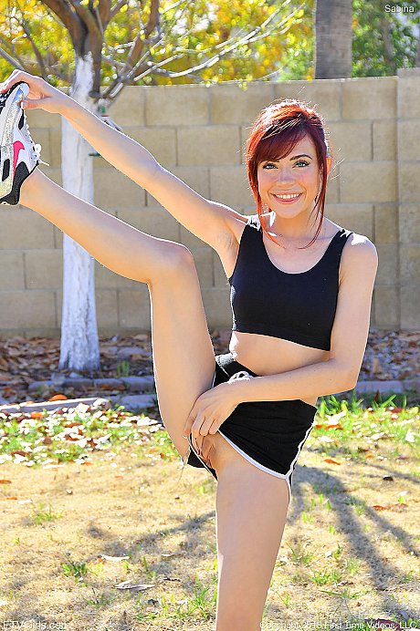 Frisky red hair teenie Sabina strips in public and does yoga behind naked - Image 7 of 20  in Model category   featuring Sabina Rouge 