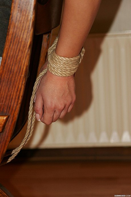 Braless brunette Leyla gagged and tied to a rocker in a shirt, jeans & boots - Image 4 of 20  in Close Up category   featuring Leyla 