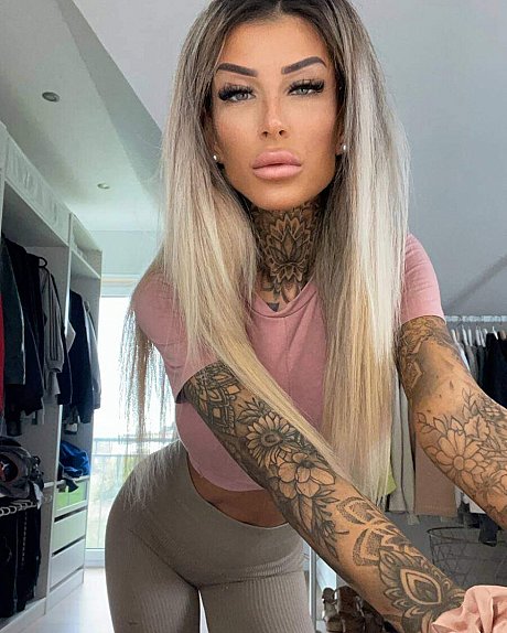 Inked glamour babe flashes her juicy boobs while showing off her tattoos - Image 2 of 14  in Model category  