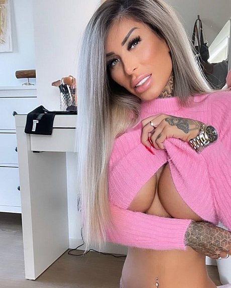 Inked glamour babe flashes her juicy boobs while showing off her tattoos - Image 4 of 14  in Model category  