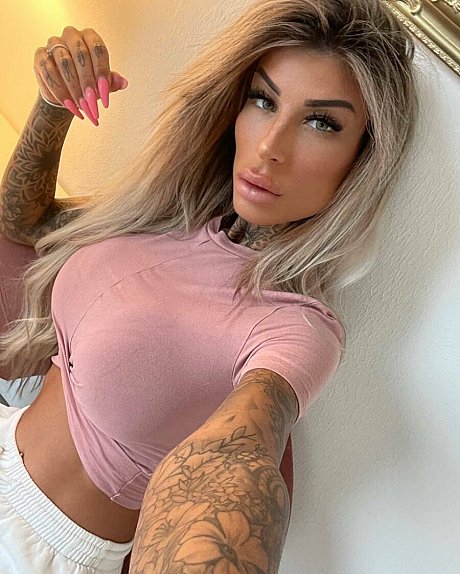 Inked glamour babe flashes her juicy boobs while showing off her tattoos - Image 9 of 14  in Model category  