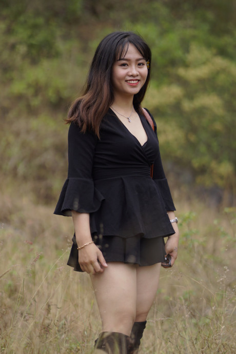 Pretty asian babe posing in her black dress and boots in nature - #1100106