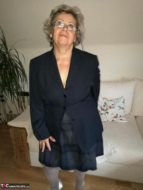 Older old lady dildos her vagina in sheer stockings and garter ensemble - #1316119