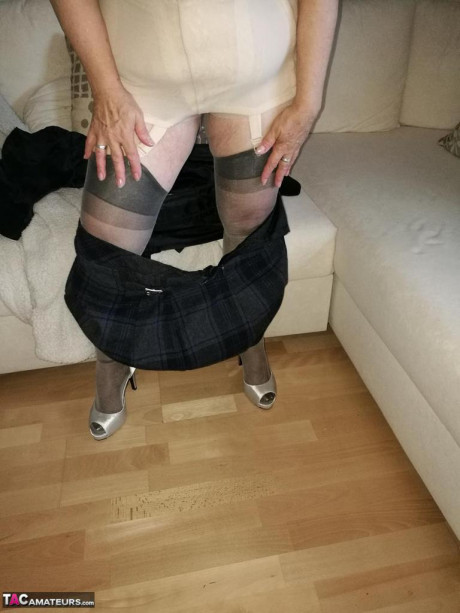 Older old lady dildos her vagina in sheer stockings and garter ensemble - #1316130