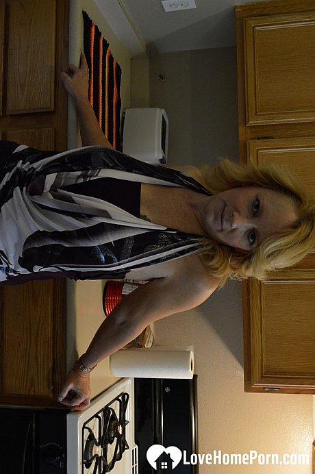 Cougar blondy strips in the kitchenette & rubs her juicy breasts and hot cunt - Image 5 of 20  in Amateur category   featuring Brandie Sweet 