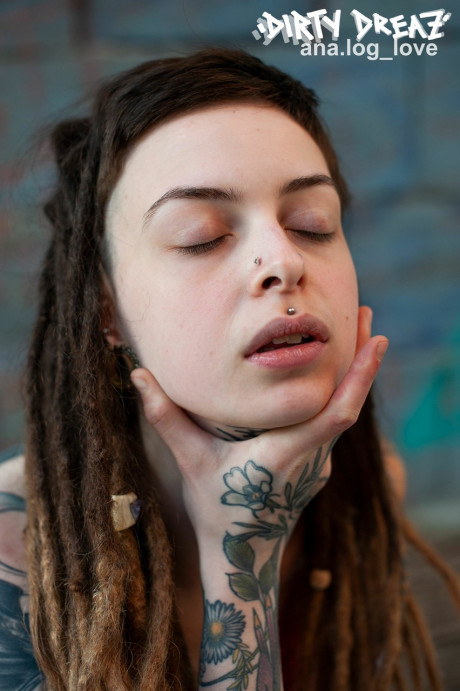 Tattooed female Cutz sports dreadlocks while showing her tiny breasts - #482407