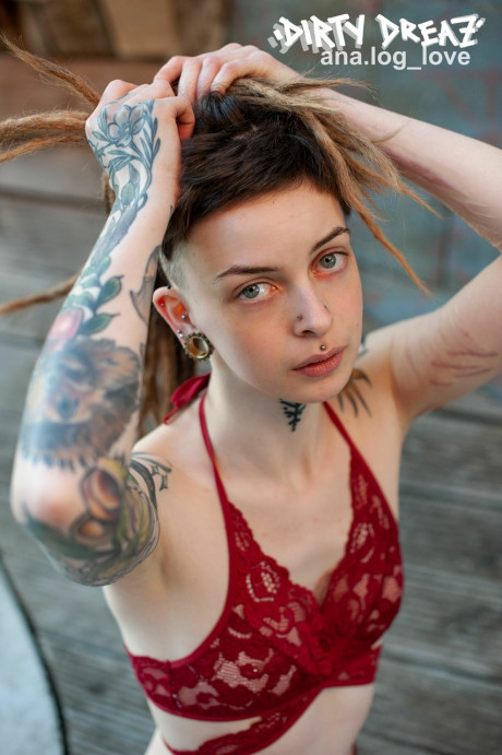 Tattooed female Cutz sports dreadlocks while showing her tiny breasts - #482409