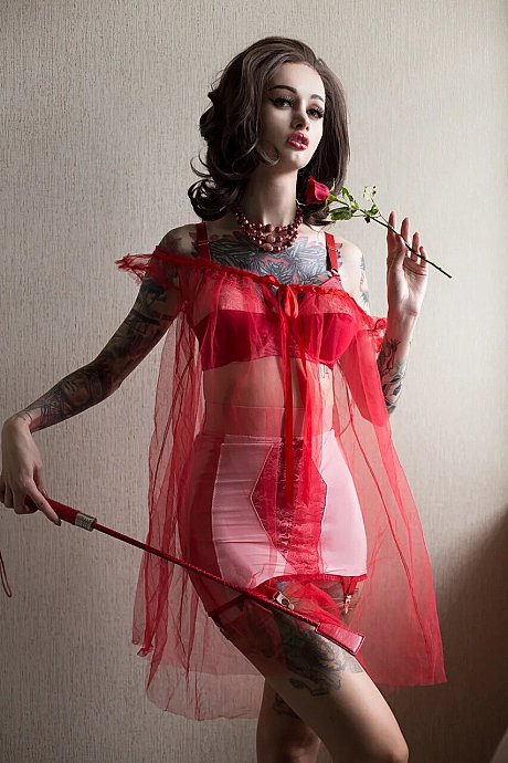 Glamour babe shows off her tattooed body in charming outfits in a hot compilation - Image 1 of 17  in Model category  