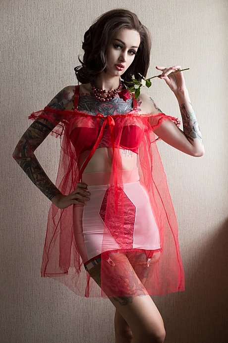 Glamour babe shows off her tattooed body in charming outfits in a hot compilation - Image 2 of 17  in Model category  