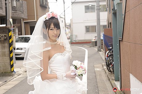 Pretty Japanese bride Ruri Narumiya poses on the street during her massive day - Image 5 of 15  in Outdoor category   featuring Ruri Narumiya 