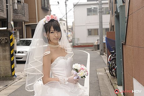 Pretty Japanese bride Ruri Narumiya poses on the street during her massive day - Image 8 of 15  in Outdoor category   featuring Ruri Narumiya 