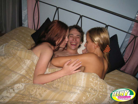 Bisexual teens and their fuck buddy spend that day in bed having a fling