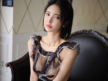 Charming Korean babe teases with her body in a seductive sheer maid uniform - Image 1 of 12  in Model category  