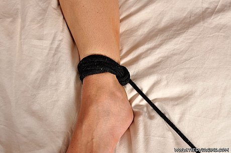 Topless white whore girl woman sports a ball gag while tied to a bed - Image 2 of 12  in Legs category  