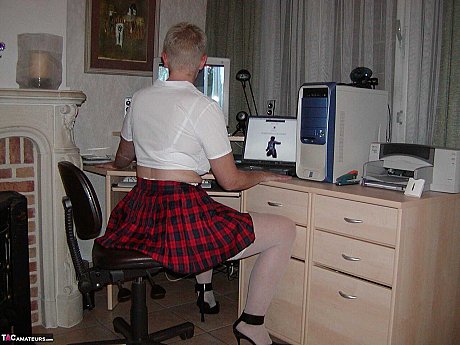 Cougar broad Tiffany Pearl partakes in upskirt play while dressed as a schoolgirl - Image 1 of 16  in Skirt category   featuring Tiffany Pearl 