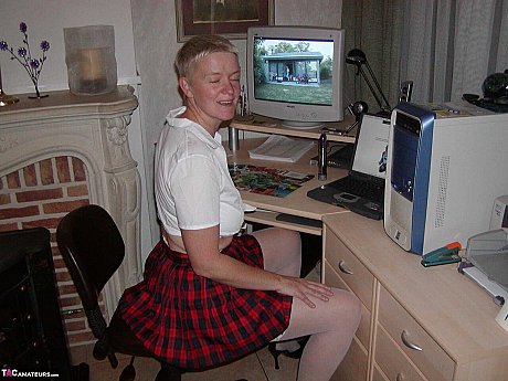 Cougar broad Tiffany Pearl partakes in upskirt play while dressed as a schoolgirl - Image 2 of 16  in Skirt category   featuring Tiffany Pearl 