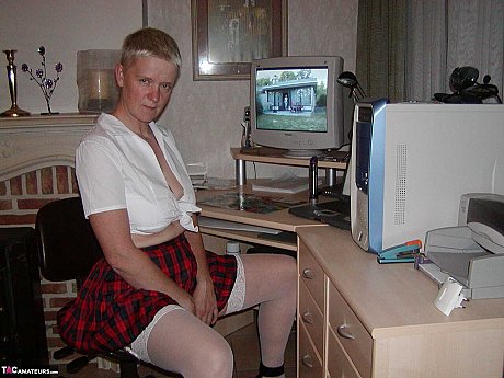 Cougar broad Tiffany Pearl partakes in upskirt play while dressed as a schoolgirl - Image 3 of 16  in Skirt category   featuring Tiffany Pearl 