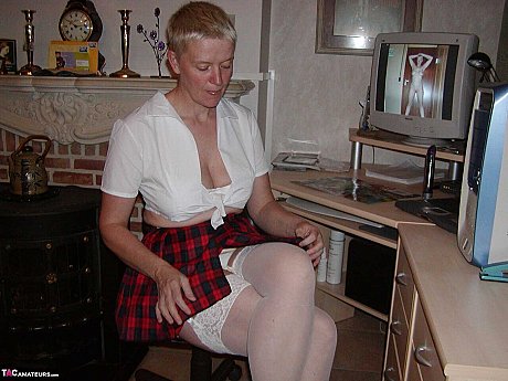 Cougar broad Tiffany Pearl partakes in upskirt play while dressed as a schoolgirl - Image 5 of 16  in Skirt category   featuring Tiffany Pearl 