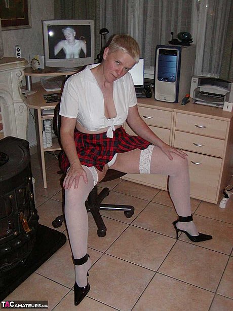 Cougar broad Tiffany Pearl partakes in upskirt play while dressed as a schoolgirl - Image 8 of 16  in Skirt category   featuring Tiffany Pearl 