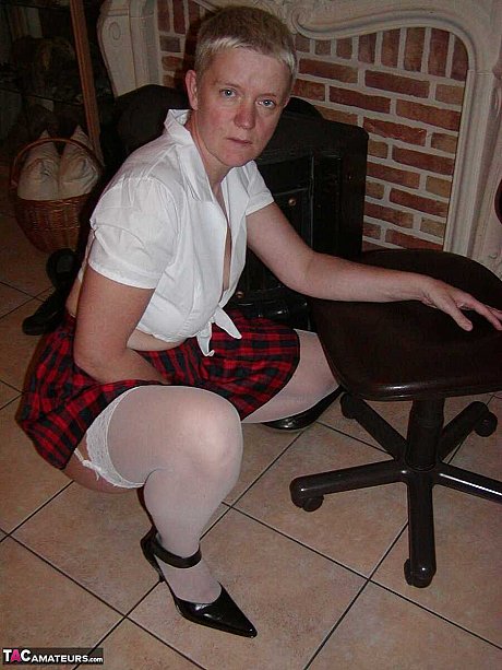 Cougar broad Tiffany Pearl partakes in upskirt play while dressed as a schoolgirl - Image 13 of 16  in Skirt category   featuring Tiffany Pearl 